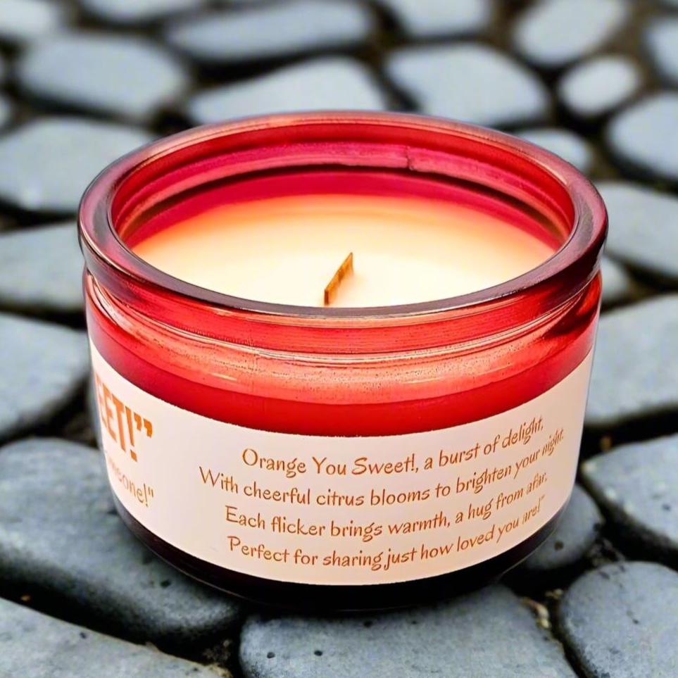 topvieworangeyousweetsignaturecollectioncoconutsoycandleintrepidglow_1