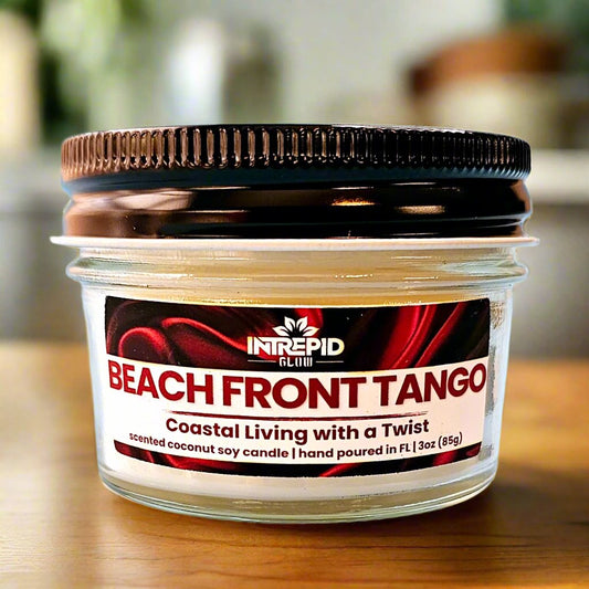 frontviewbeachfronttangoclassiccollectionscentedcoconutsoycandleintrepidglow