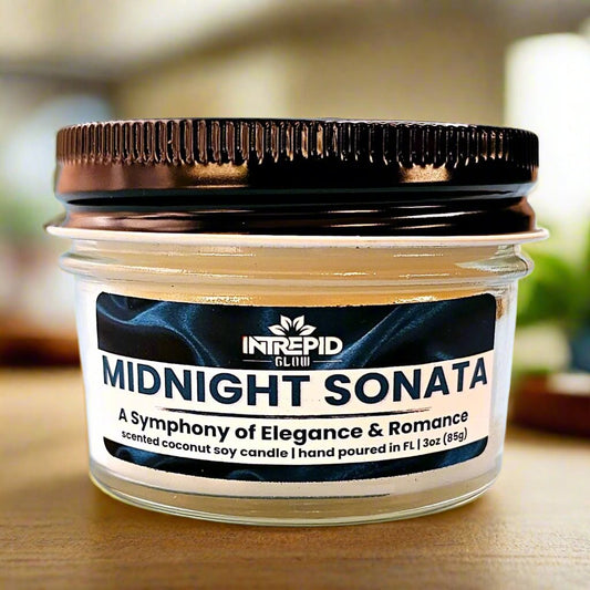 frontviewmidnightsonataclassiccollectionscentedcoconutsoycandleintrepidglow